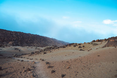 Scenic view of desert against sky