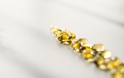 Close-up of pearl jewelry on white background