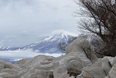 Snow covered mountain against sky