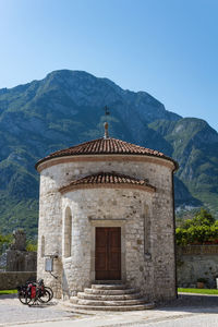 View of building with mountain range in background