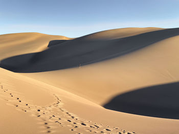 Scenic view of desert against sky