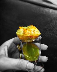 Close-up of hand holding drink