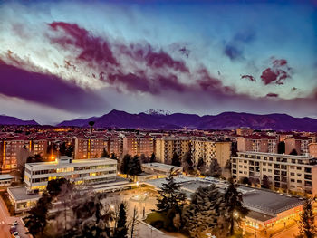 High angle view of illuminated buildings in city