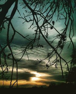 Scenic view of landscape against sky at sunset