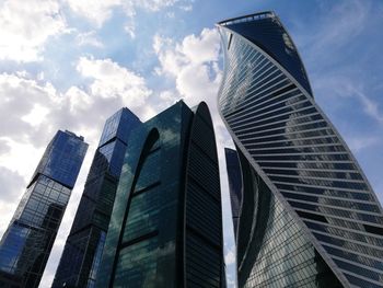 Low angle view of modern buildings against sky