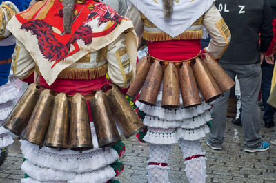 Panoramic view of people standing in traditional clothing