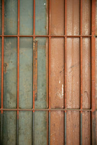Full frame shot of weathered iron door