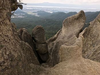 Scenic view of landscape and mountains against sky