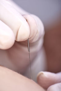 Close-up of woman holding hands