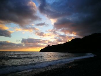 Scenic view of sea against sky during sunset