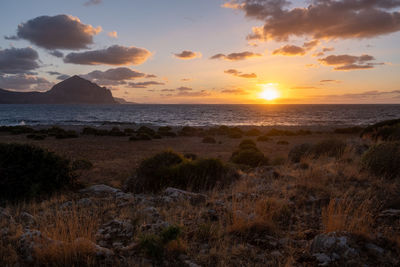 Scenic view of sea against sky during sunset