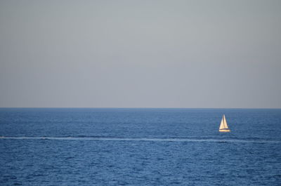 Boat sailing in sea