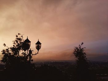 Silhouette tree against sky during sunset