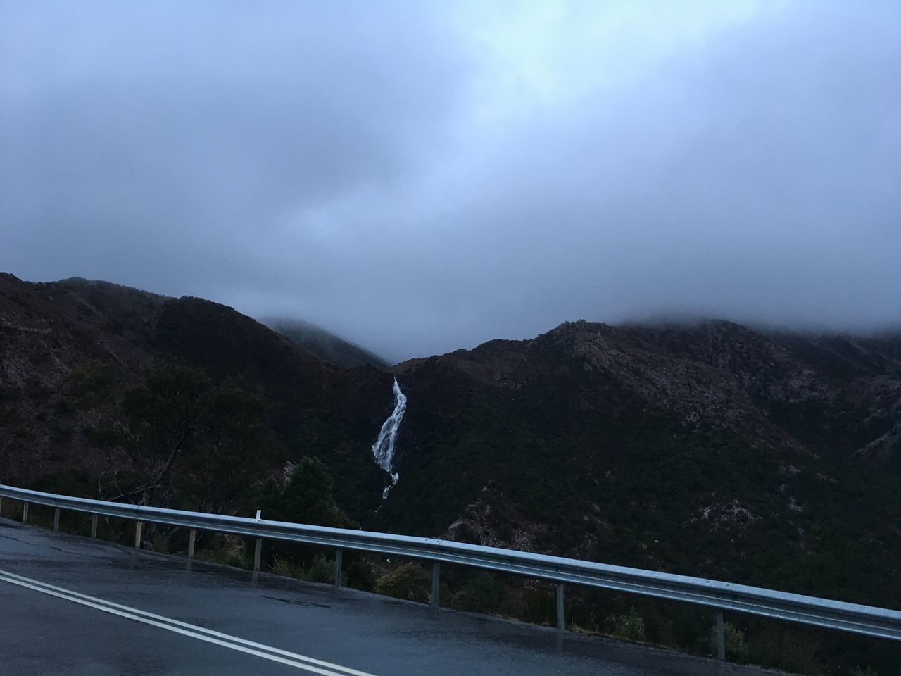 MOUNTAIN ROAD AGAINST SKY