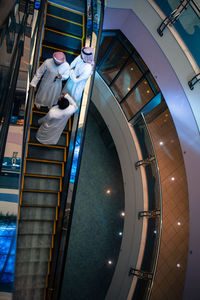 High angle view of people on escalator