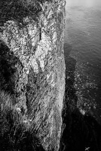 High angle view of rock formation in sea