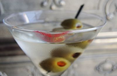 Close-up of cocktail in martini glass on table