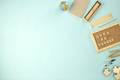 High angle view of text on table against blue background