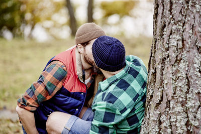 Homosexual couple kissing