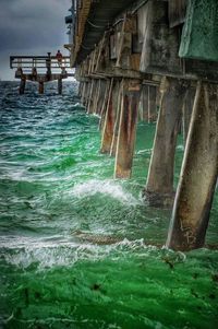 Pier over sea against sky