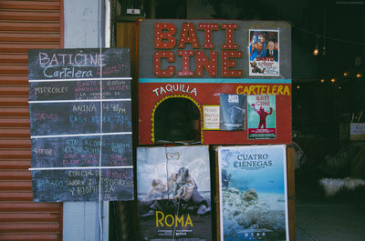 Close-up of information sign on store