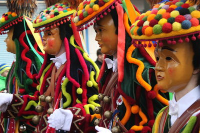 Close-up of people wearing masks