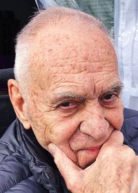 Close-up portrait of man wearing mask