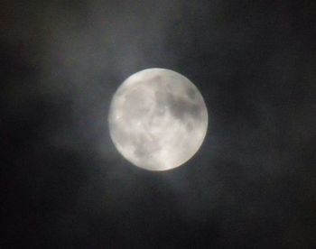 Low angle view of moon against sky