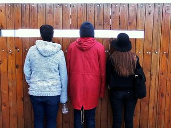 Group of people standing in the dark