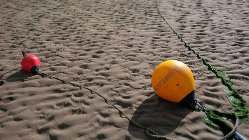 High angle view of ball on sand at beach