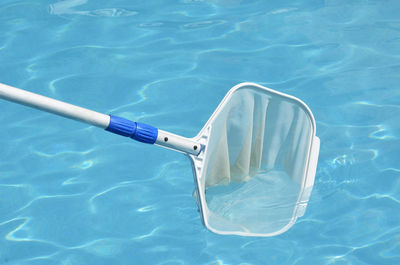 High angle view of cleaner on swimming pool