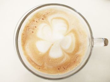 Directly above shot of cappuccino on table