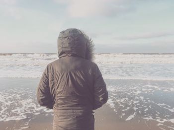 Rear view of a man on beach