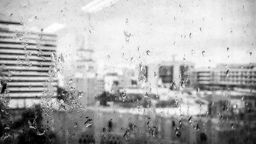 Full frame shot of wet window in rainy season