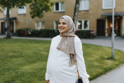 Smiling woman walking