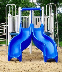 Empty chairs in playground