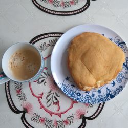 High angle view of cookies and coffee on table