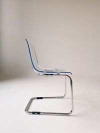 Close-up of paper clips on white background