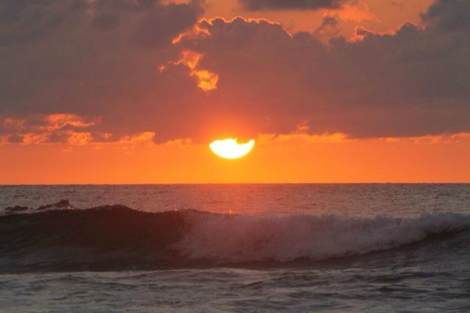 sea, horizon over water, sunset, water, scenics, sky, beauty in nature, tranquil scene, orange color, beach, tranquility, wave, cloud - sky, idyllic, nature, sun, shore, waterfront, seascape, cloud
