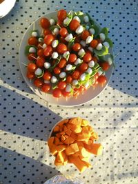 Directly above shot of caprese salad in plate on table