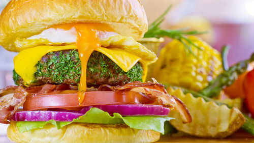 Close-up of burger put on the table