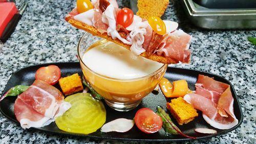 Close-up of food served on table