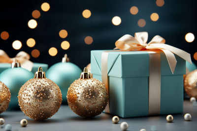 Close-up of christmas baubles on table