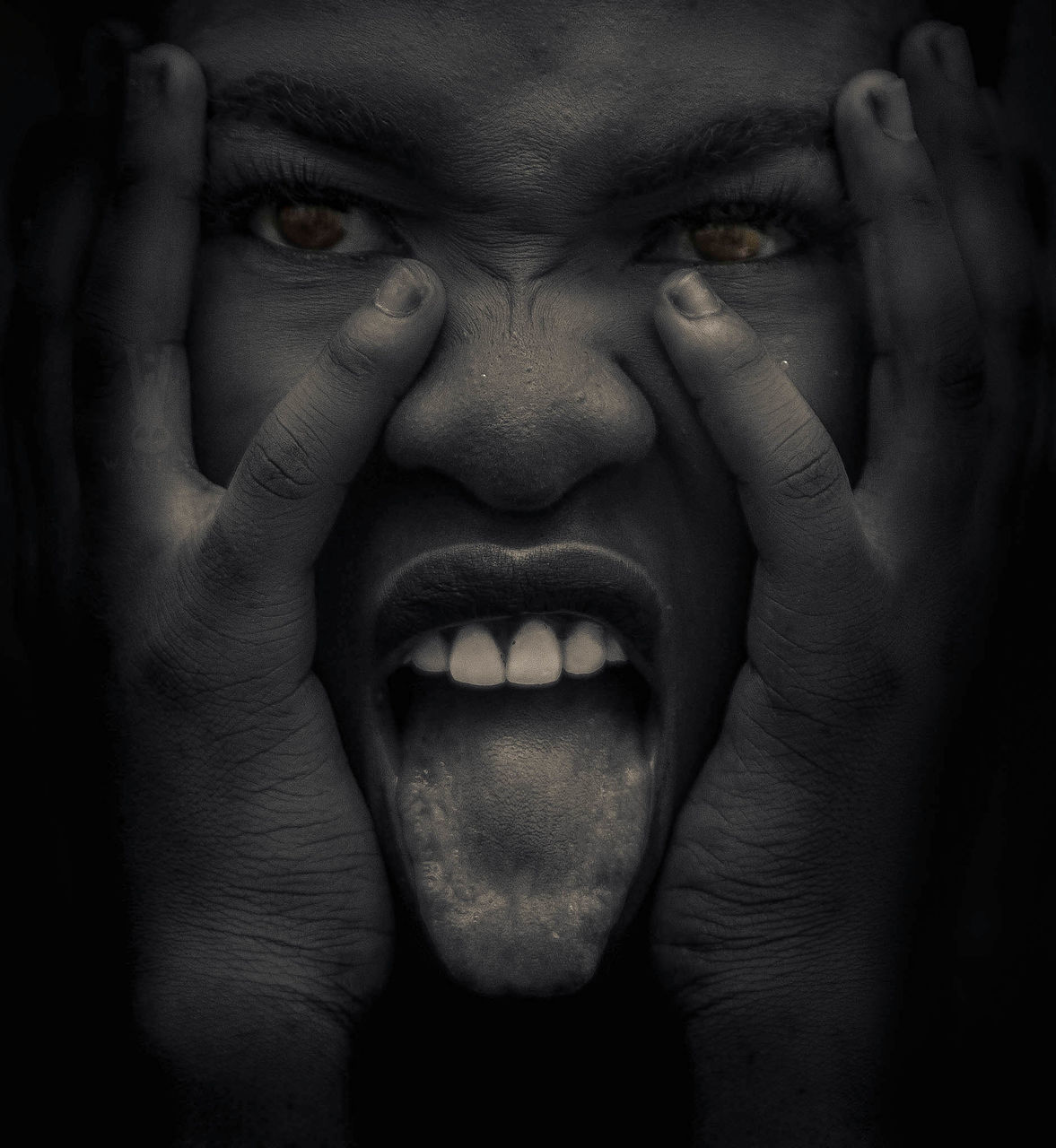 human body part, one person, close-up, portrait, shouting, emotion, aggression, human face, negative emotion, looking at camera, anger, body part, front view, real people, mouth, mouth open, men, fear, hand, frustration, human teeth, black background, digital composite