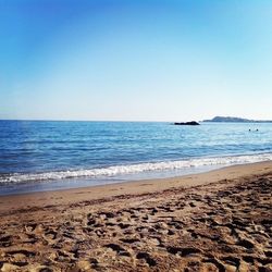 Scenic view of sea against clear sky