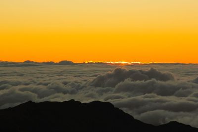 Scenic view of dramatic sky during sunset