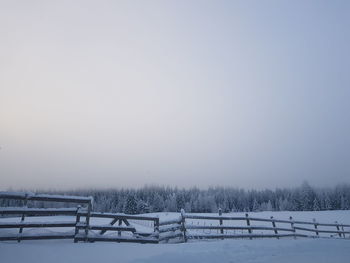 Scenic view of snow field against clear sky