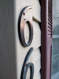 Close-up of open book on wall