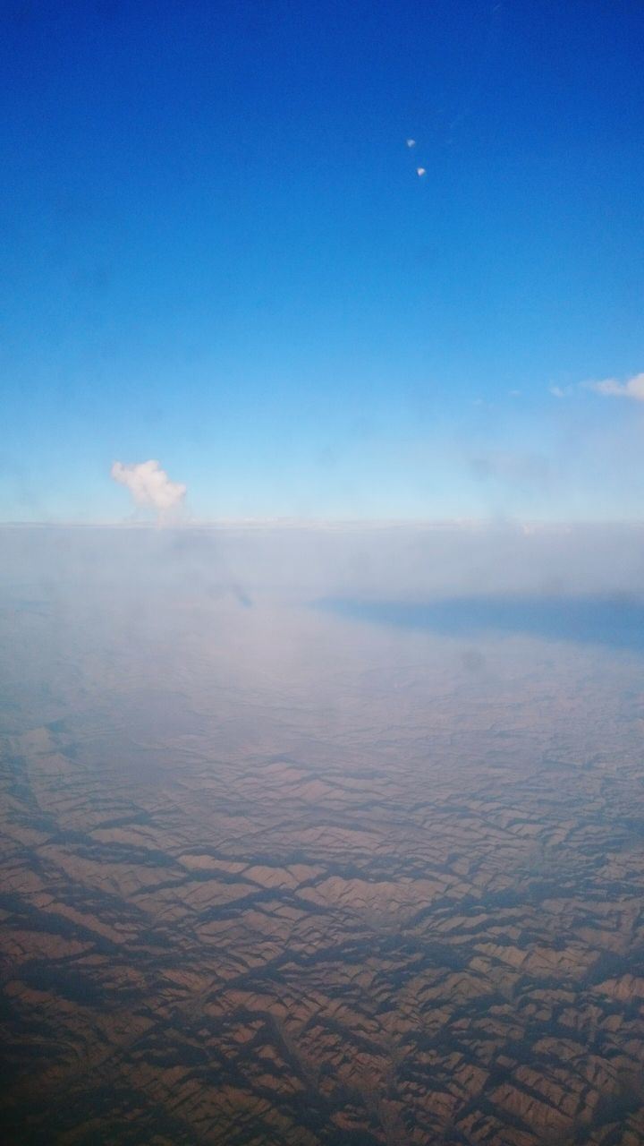 blue, scenics, tranquil scene, water, tranquility, beauty in nature, sea, sky, nature, waterfront, copy space, idyllic, horizon over water, seascape, outdoors, aerial view, no people, calm, day, clear sky