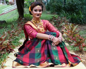 Portrait of young woman in traditional clothing